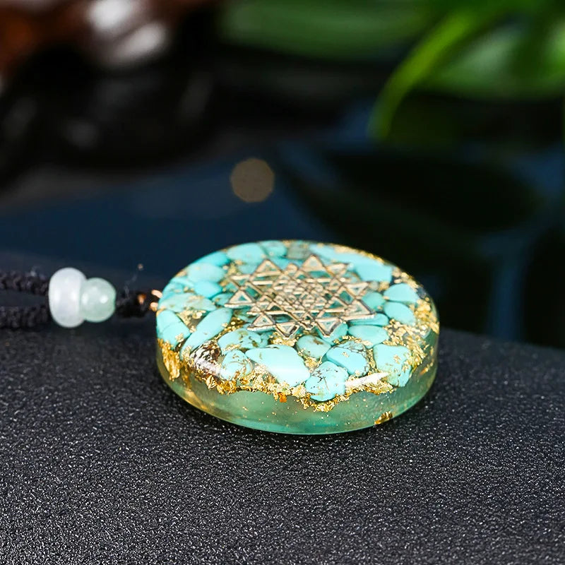 Pendentif Lotus Orgonite Turquoise & Om