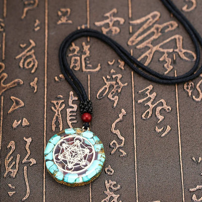 Pendentif Lotus Orgonite Turquoise & Om